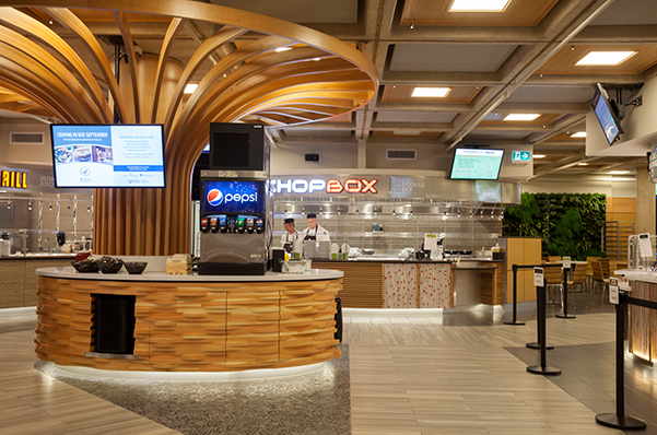 Curved wood slat food service counter, University of Victoria